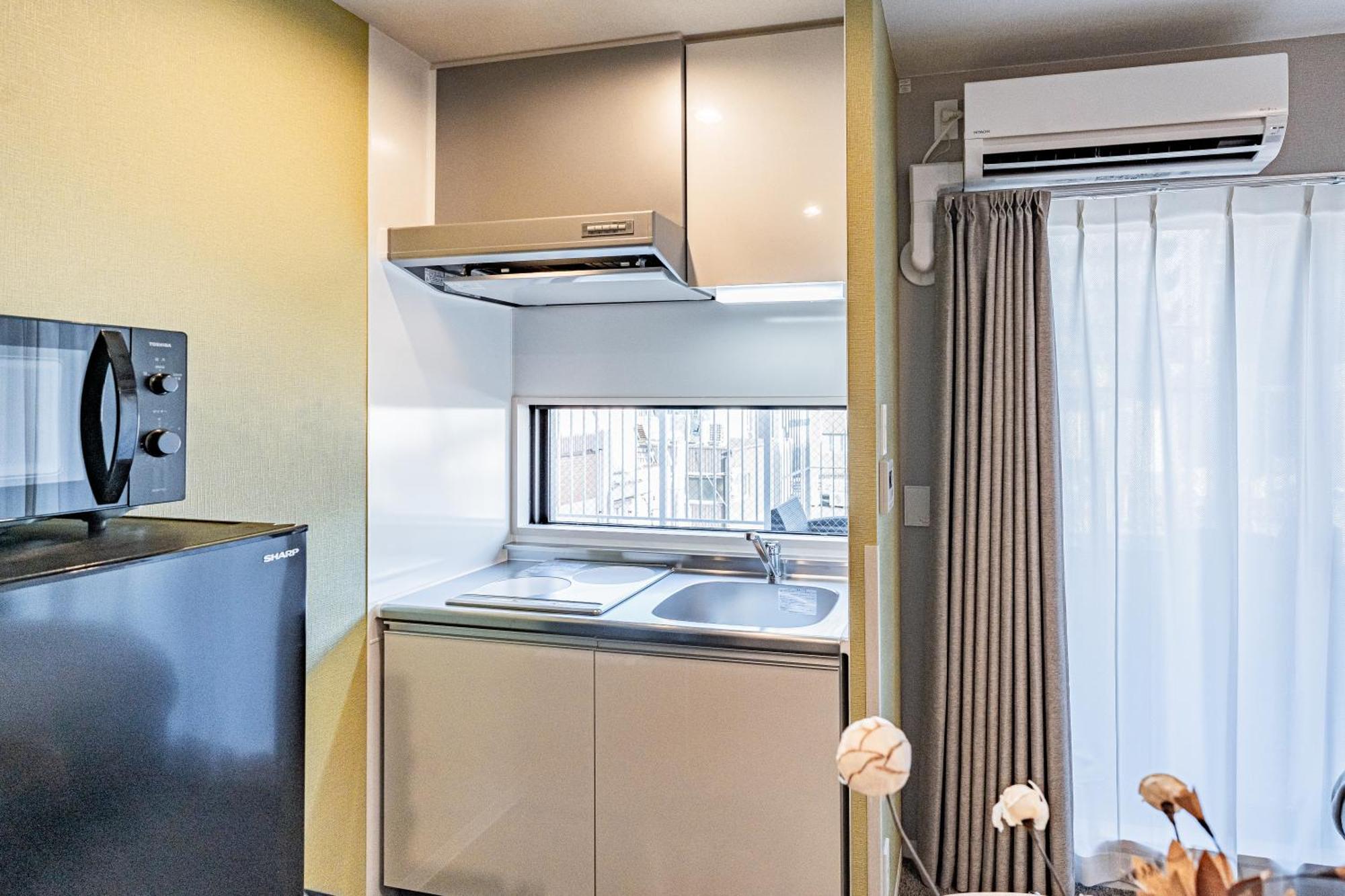 Apartment Hotel 11 Umeda Kamiyama Oszaka Kültér fotó