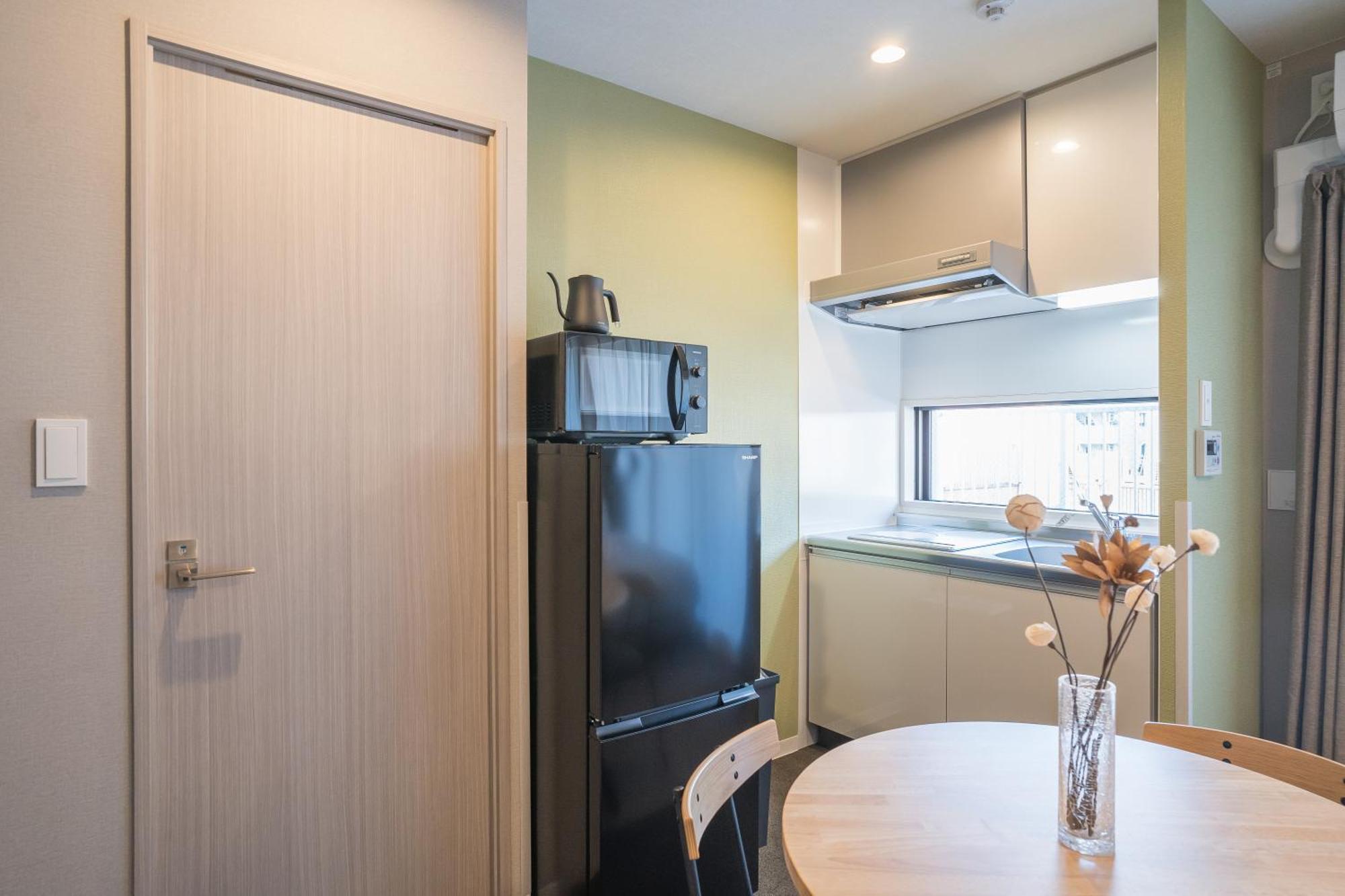 Apartment Hotel 11 Umeda Kamiyama Oszaka Szoba fotó